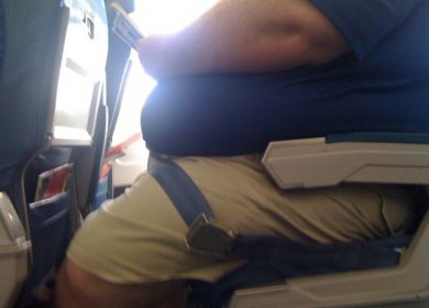 passeggero aereo obeso