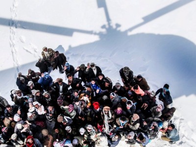 immigrati prelevati da elicottero