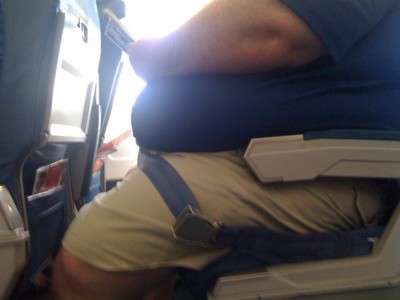 passeggero aereo obeso